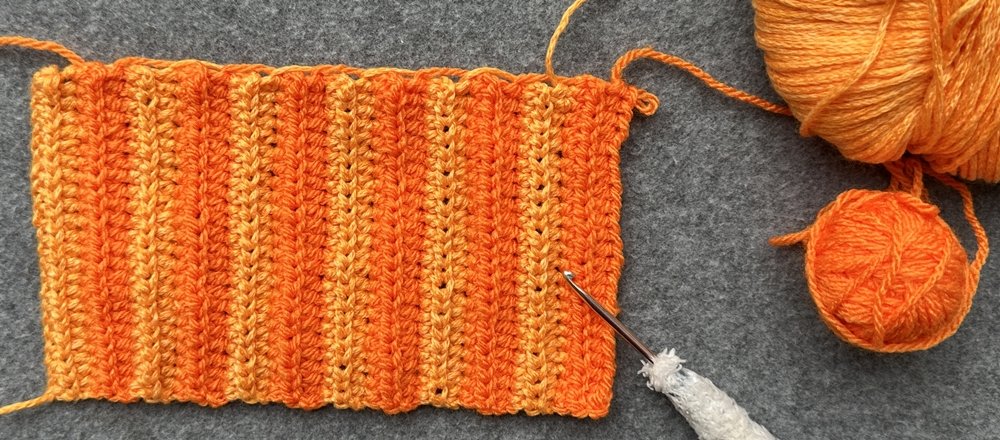 Blog-Inhaltsbild für 'Kleine Kürbisse als Schlüsselanhänger oder Taschenbaumler häkeln'