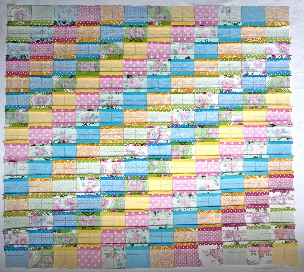 Blog-Inhaltsbild für 'Näh-Workshop Teil 2: Patchwork-Bettdecke für das Puppenbett'