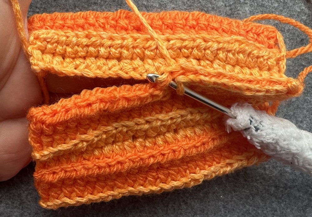 Blog-Inhaltsbild für 'Kleine Kürbisse als Schlüsselanhänger oder Taschenbaumler häkeln'