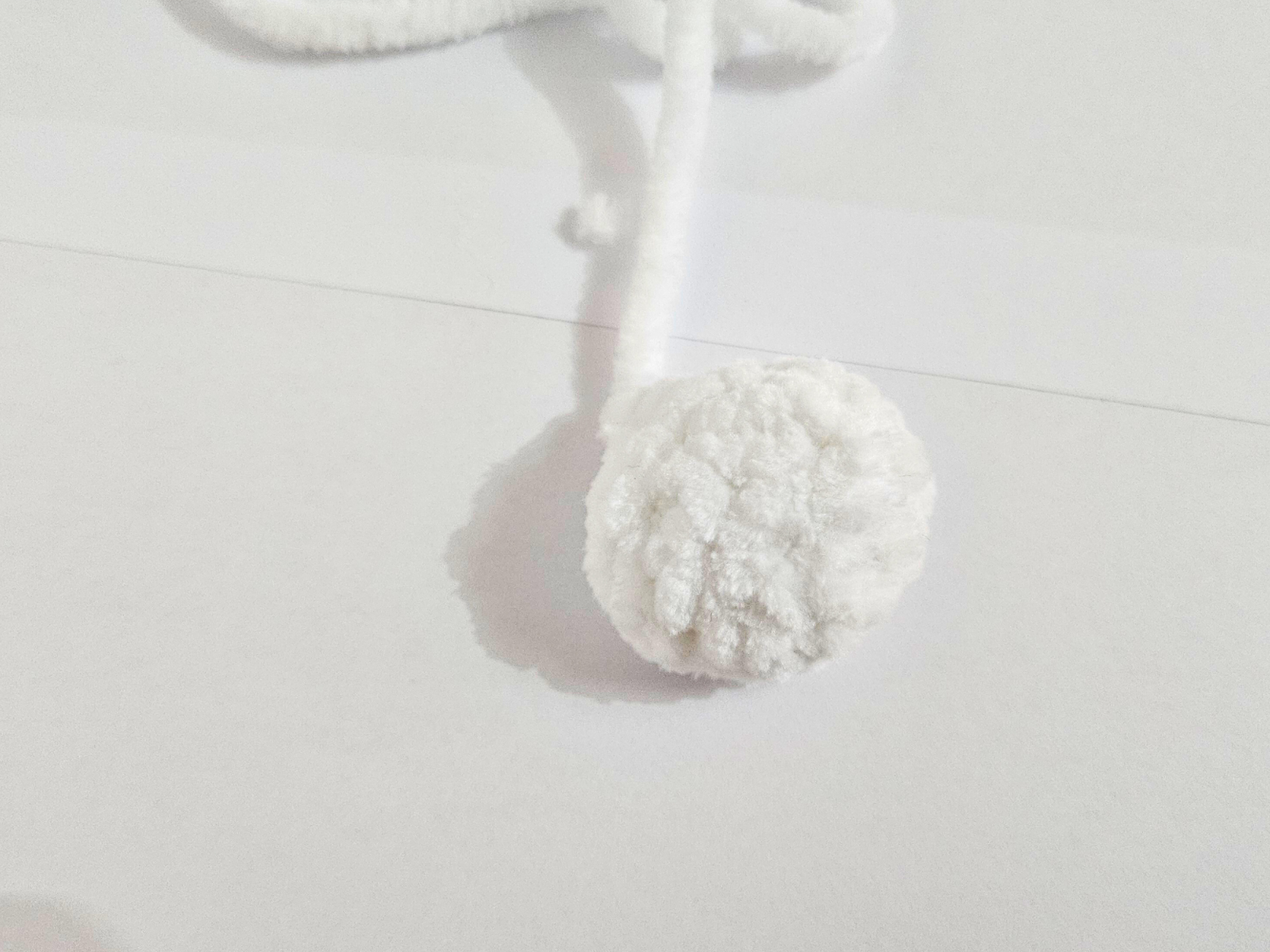 Blog content image for 'Free amigurumi crochet pattern for a small cat made with chenille yarn'