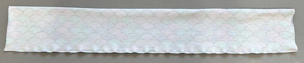 Blog-Inhaltsbild für 'Modernes Knoten-Stirnband in 2 Varianten nähen – Ratzfatz fertig'