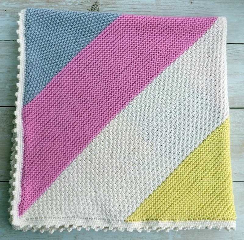 Blog-Inhaltsbild für 'Die weichste Babydecke der Welt im Mustermix - Kostenlose Strickanleitung'