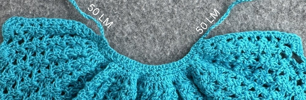 Blog-Inhaltsbild für 'Überrock oder Cape für kleine Puppen häkeln  – kostenlose Häkelanleitung'