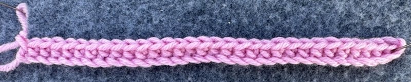 Blog-Inhaltsbild für 'Bunte Decke aus Wollresten häkeln'