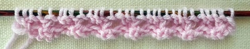 Blog-Inhaltsbild für 'Gratis Strickanleitung Decke im Röschenmuster'