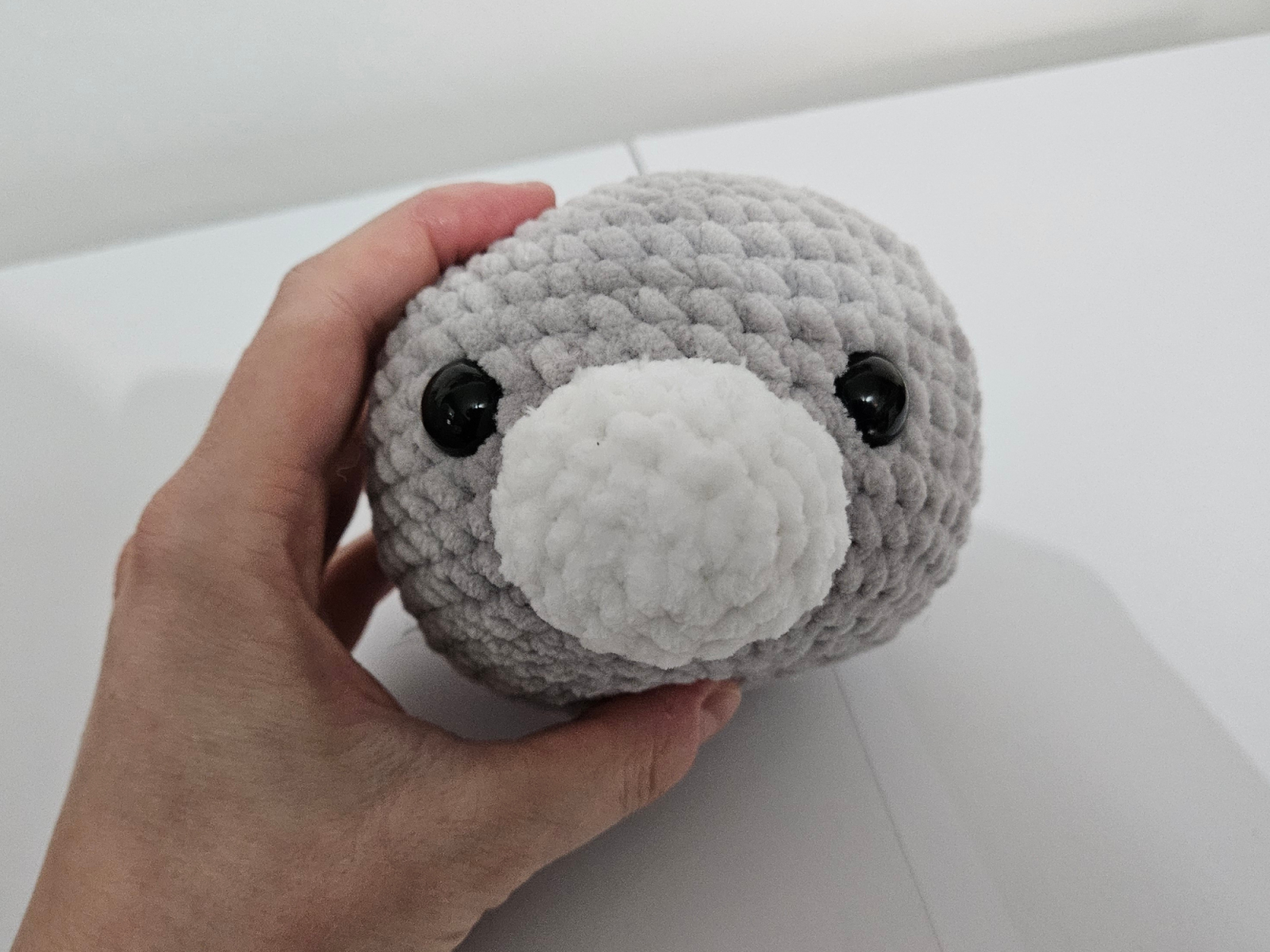 Blog content image for 'Free amigurumi crochet pattern for a small cat made with chenille yarn'