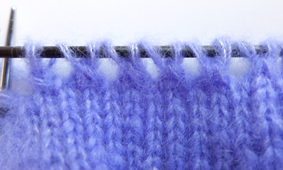 Blog-Inhaltsbild für 'Kostenlose Strickanleitung - Pulswärmer Deluxe'