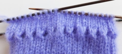 Blog-Inhaltsbild für 'Kostenlose Strickanleitung - Pulswärmer Deluxe'