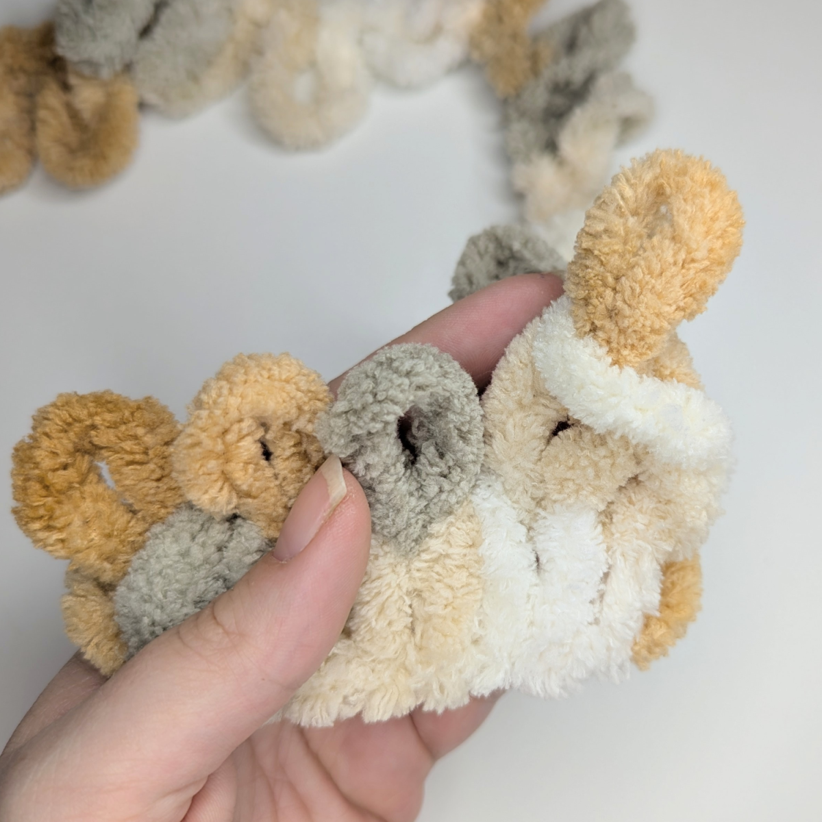 Abketten Masche durchziehen