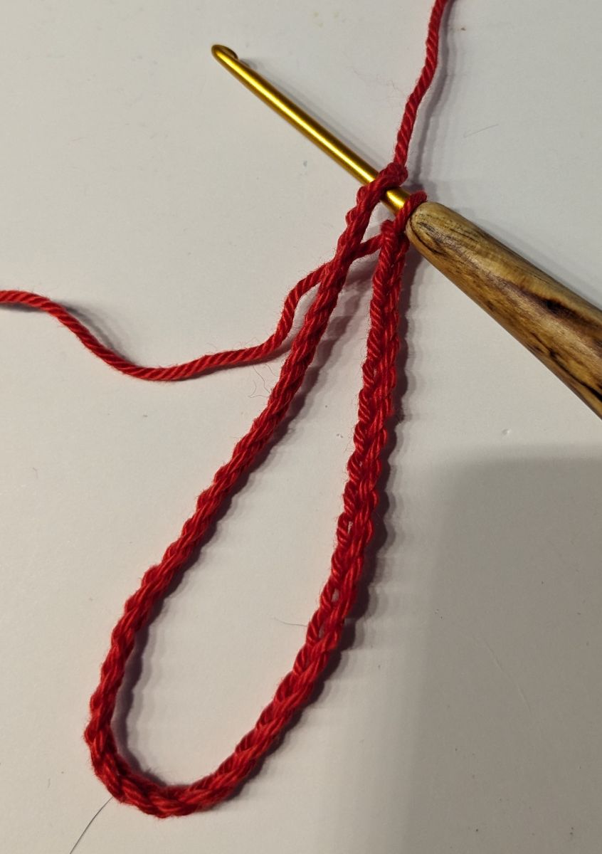 Blog-Inhaltsbild für 'Kostenlose Anleitung Glückswürmchen Sorgenwürmchen Clown mit Haaren und Hut'