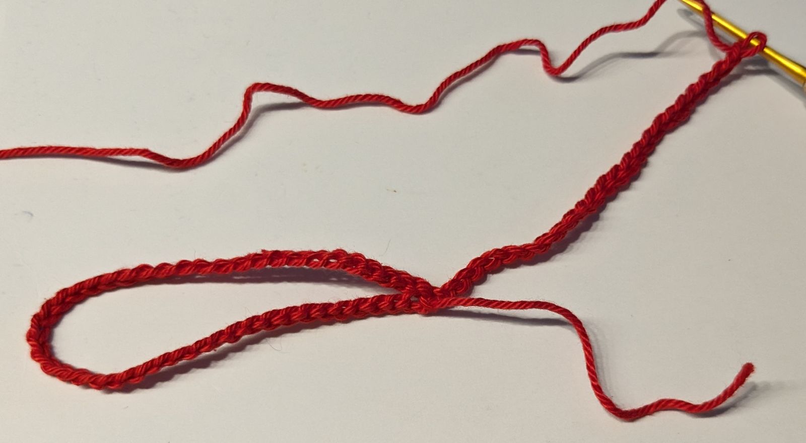 Blog-Inhaltsbild für 'Kostenlose Anleitung Glückswürmchen Sorgenwürmchen Clown mit Haaren und Hut'