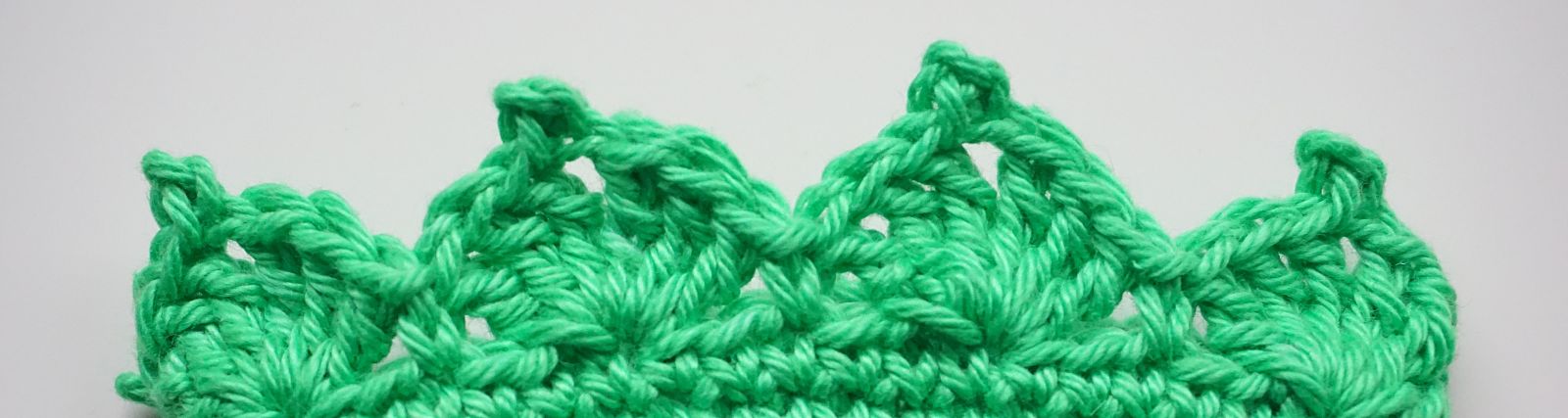 Blog-Inhaltsbild für 'Häkelanleitung Eierwärmer Tannenbäumchen - Freebie'