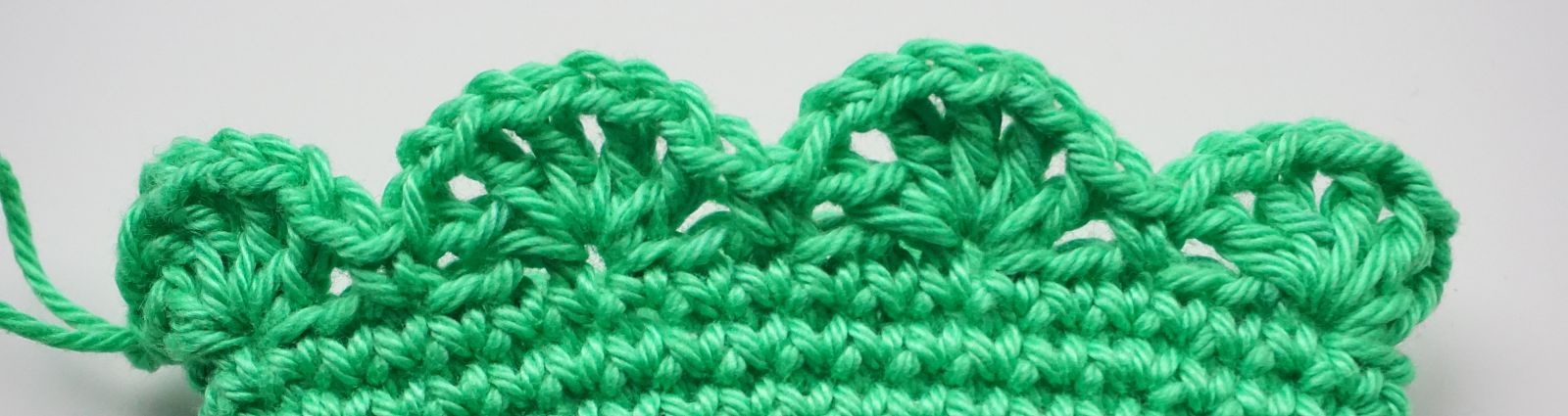 Blog-Inhaltsbild für 'Häkelanleitung Eierwärmer Tannenbäumchen - Freebie'