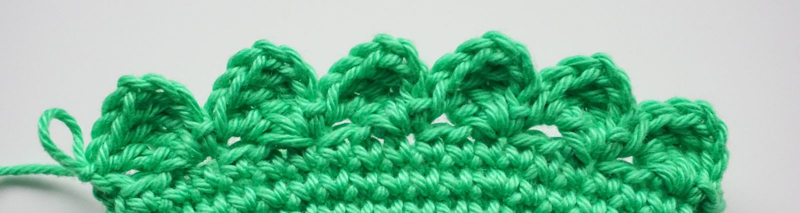 Blog-Inhaltsbild für 'Häkelanleitung Eierwärmer Tannenbäumchen - Freebie'