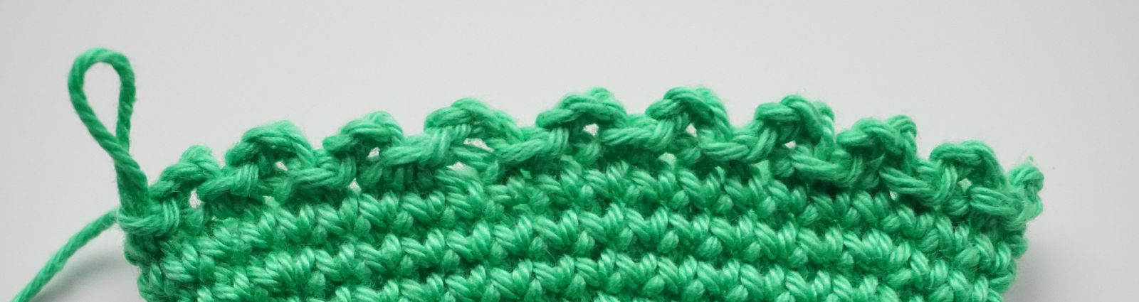 Blog-Inhaltsbild für 'Häkelanleitung Eierwärmer Tannenbäumchen - Freebie'