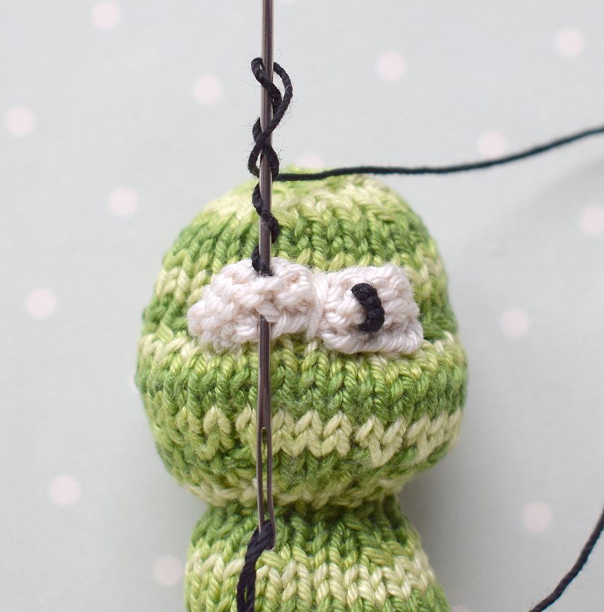 Blog-Inhaltsbild für 'Gestrickter Magnet „Apfel mit Wurm“'