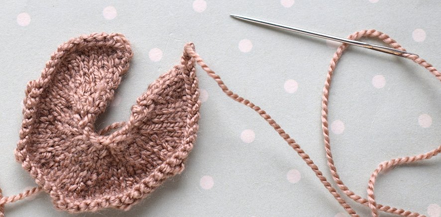 Blog-Inhaltsbild für 'Gestrickter Magnet „Apfel mit Wurm“'