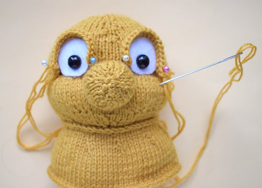 Blog-Inhaltsbild für 'Ein lustiges, gestricktes Etui für eine Wasserflasche «Raupe»'