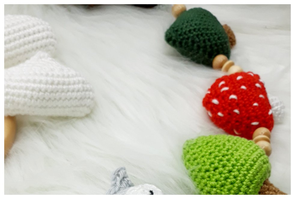 Blog-Inhaltsbild für 'Eulenkinderwagenkette, kostenlose Häkelanleitung von Wolldiamant'