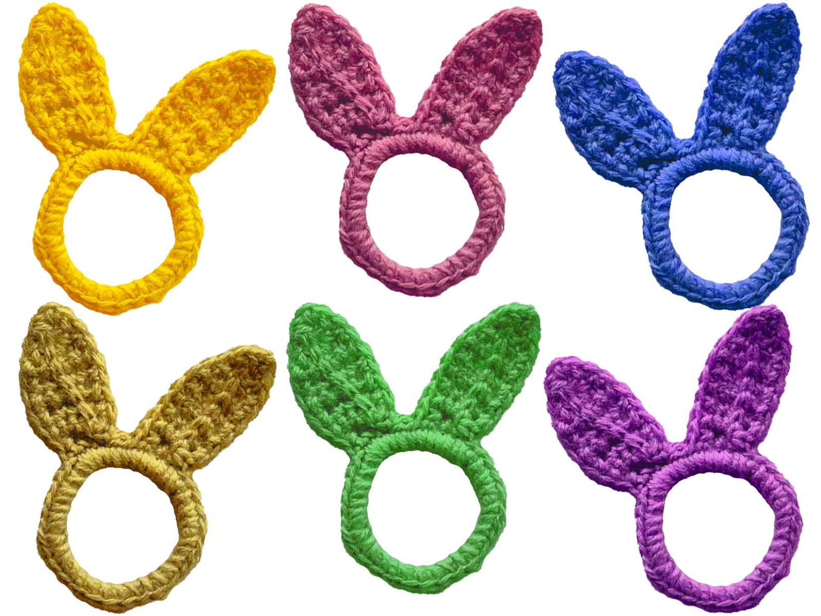 Das Bild zeigt das fertig gehäkelte Häschen Jumper in sechs verschiedenen Farben.