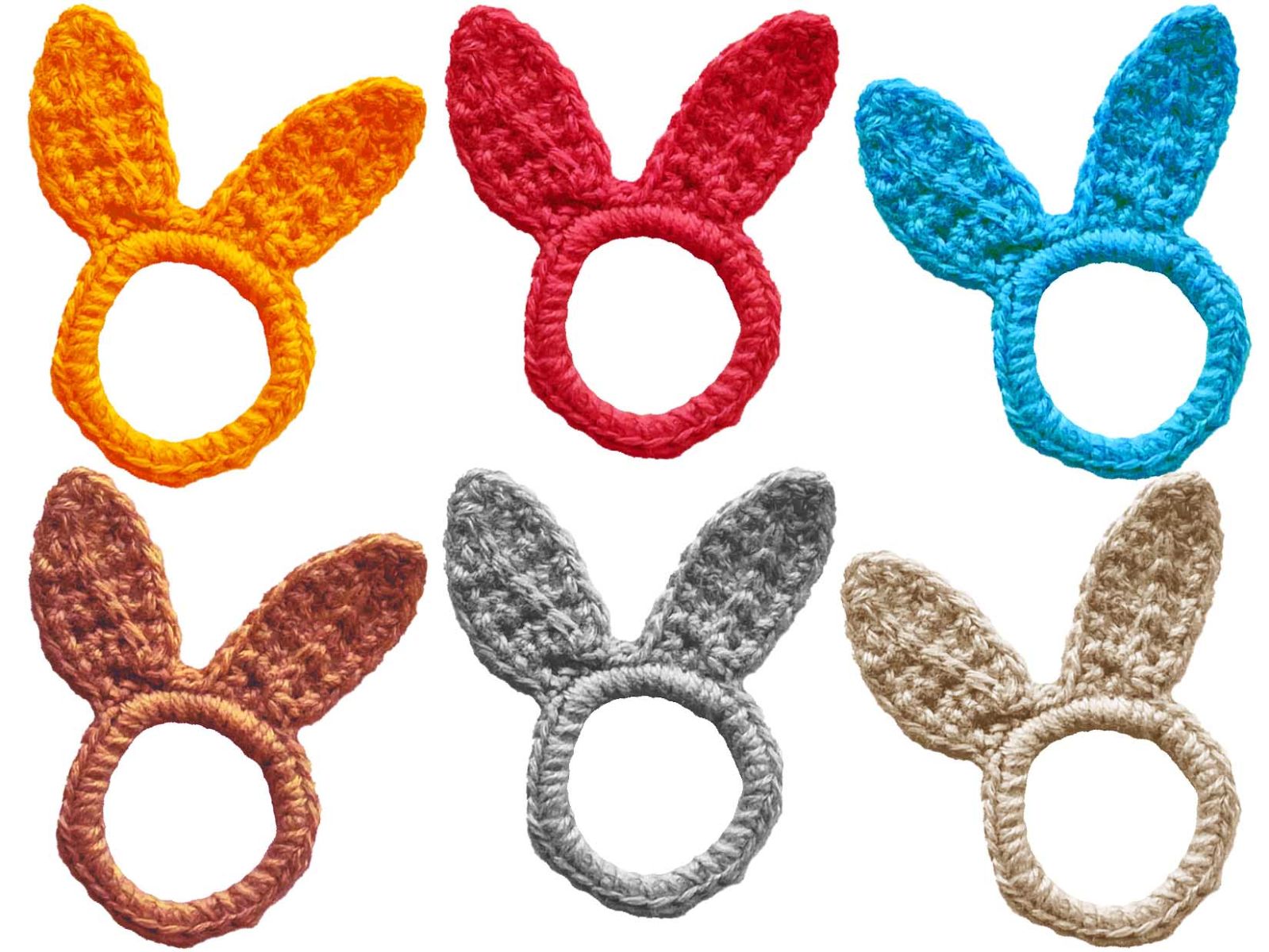Das Bild zeigt das fertig gehäkelte Häschen Jumper in weiteren sechs verschiedenen Farben.