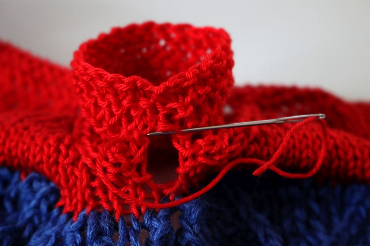 Blog-Inhaltsbild für 'Kostenlose Anleitung: Niedliche Puppenkleidchen stricken'