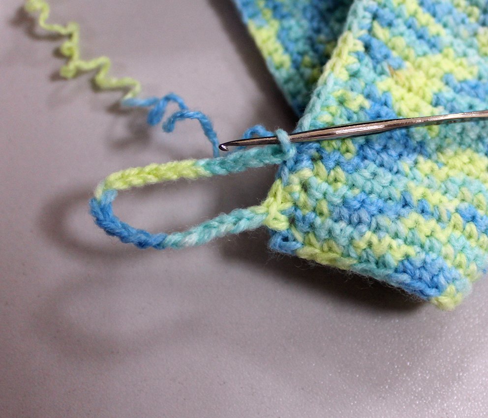 Blog-Inhaltsbild für 'Gehäkelter Tassenwärmer mit Teddybären'