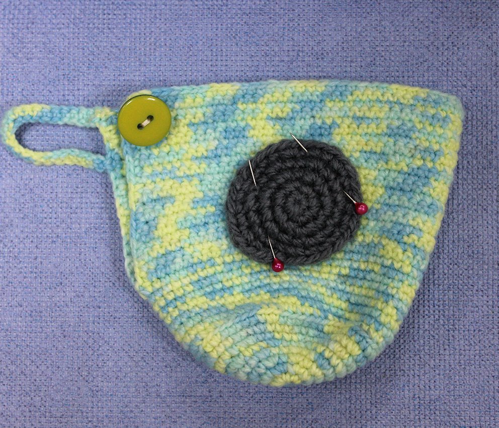 Blog-Inhaltsbild für 'Gehäkelter Tassenwärmer mit Teddybären'