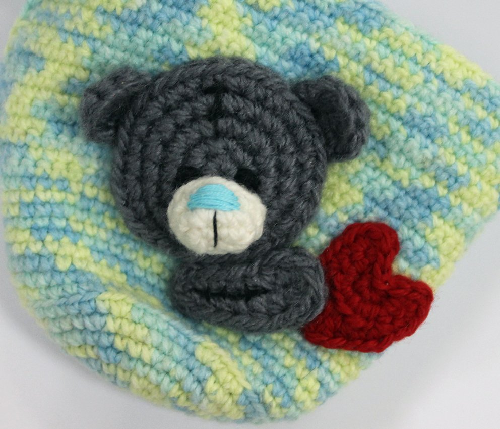 Blog-Inhaltsbild für 'Gehäkelter Tassenwärmer mit Teddybären'