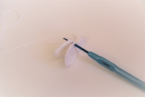 Blog-Inhaltsbild für 'Kostenlose Häkelanleitung für Schneemann-Anhänger'