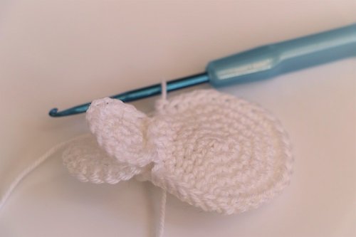 Blog-Inhaltsbild für 'Kostenlose Häkelanleitung für Schneemann-Anhänger'