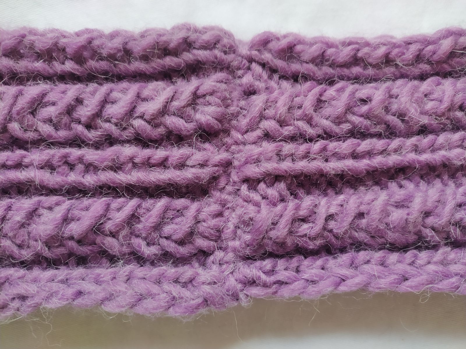 Blog-Inhaltsbild für 'Kostenlose Strickanleitung Stirnband Verschlungen'