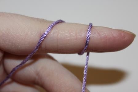 Blog-Inhaltsbild für 'Gratis Häkelanleitung für einen Mini-Handtaschenbeutel als Schlüsselanhänger'