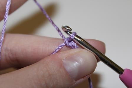 Blog-Inhaltsbild für 'Gratis Häkelanleitung für einen Mini-Handtaschenbeutel als Schlüsselanhänger'