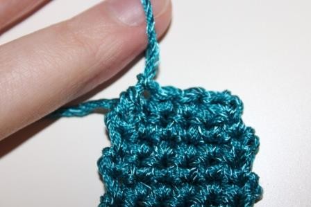 Blog-Inhaltsbild für 'Gratis Häkelanleitung für eine Mini Clutch als Schlüsselanhänger'