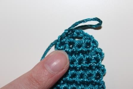 Blog-Inhaltsbild für 'Gratis Häkelanleitung für eine Mini Clutch als Schlüsselanhänger'