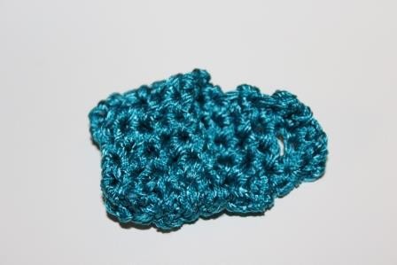 Blog-Inhaltsbild für 'Gratis Häkelanleitung für eine Mini Clutch als Schlüsselanhänger'