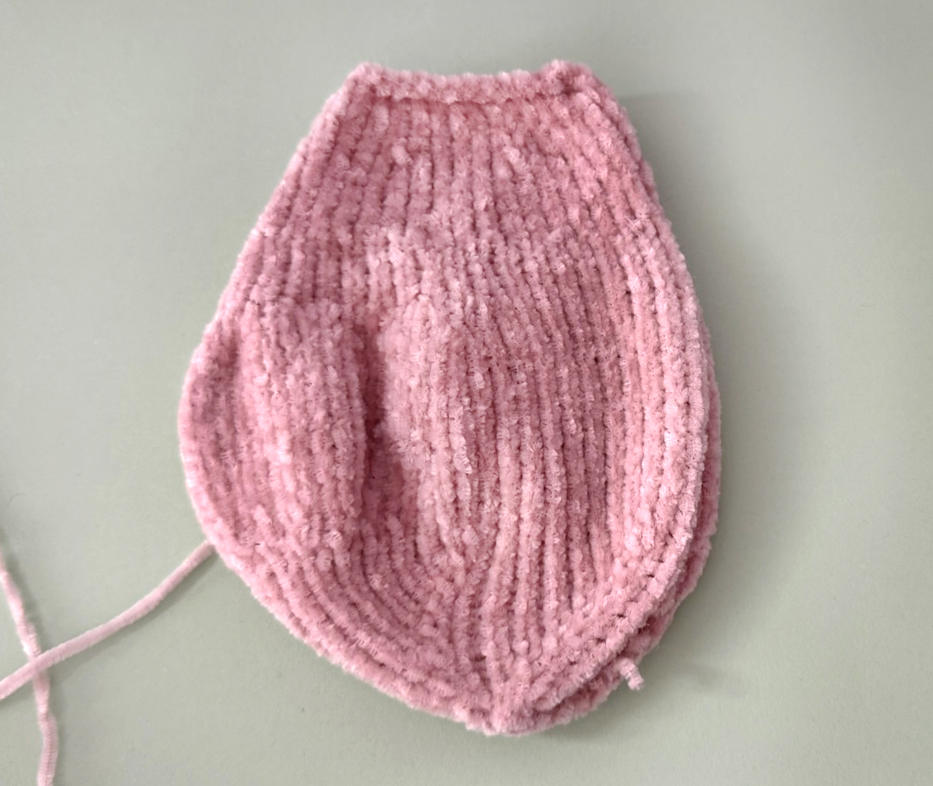 Blog content image for 'A fluffy little baby in a cozy deer, knitted.'