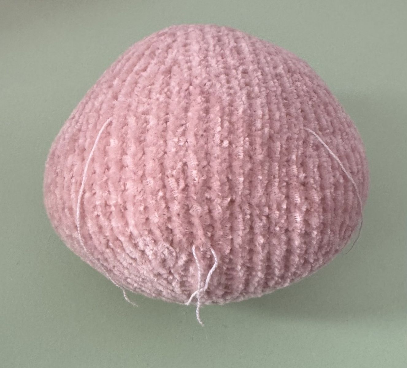 Blog content image for 'A fluffy little baby in a cozy deer, knitted.'