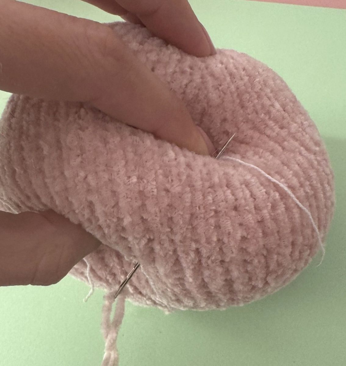 Blog content image for 'A fluffy little baby in a cozy deer, knitted.'