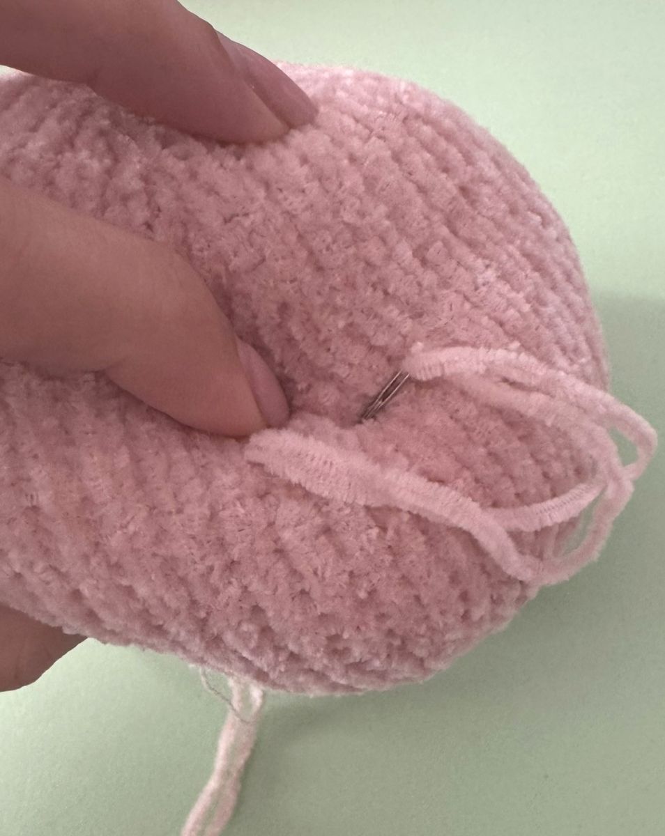 Blog content image for 'A fluffy little baby in a cozy deer, knitted.'