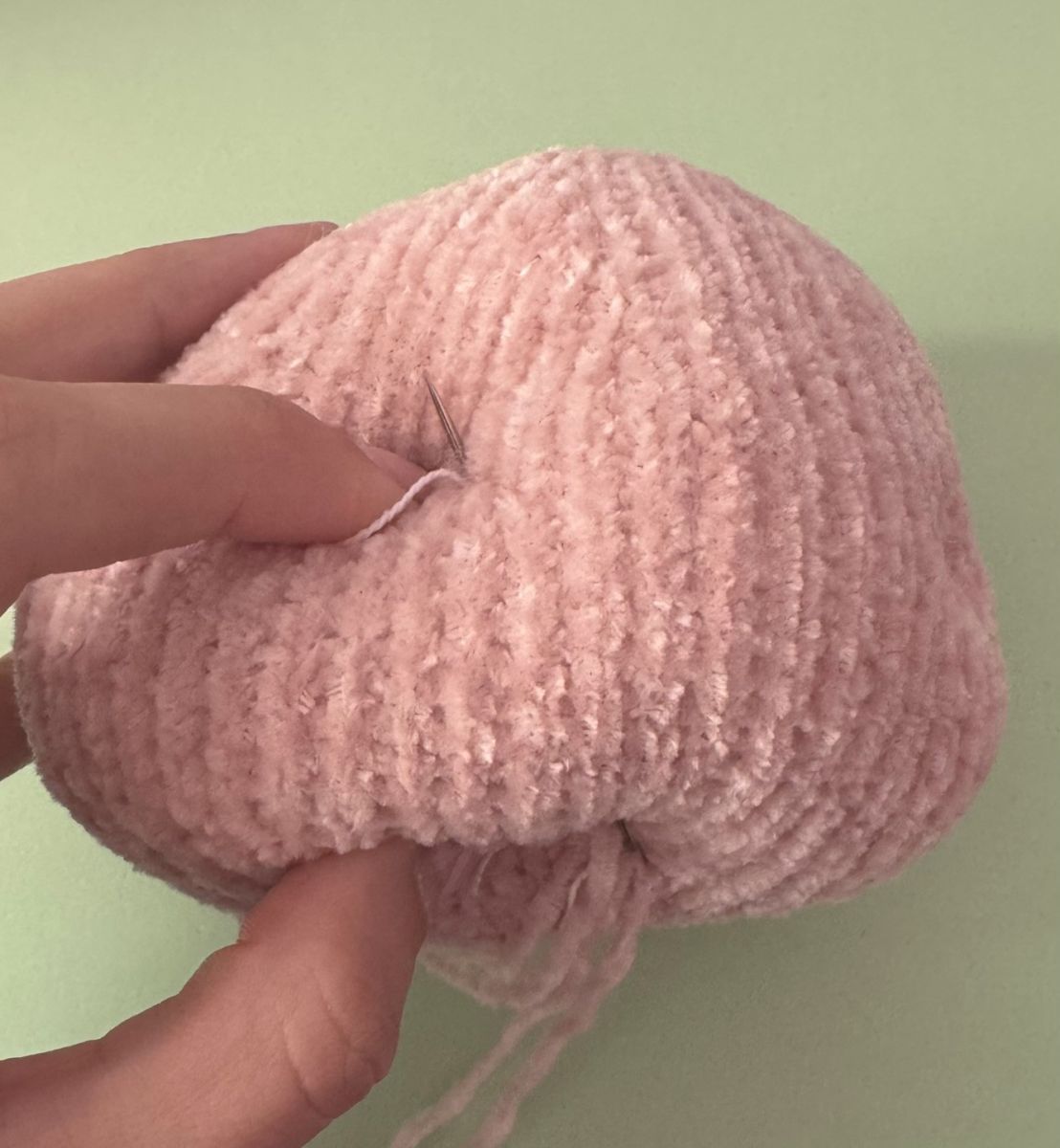 Blog content image for 'A fluffy little baby in a cozy deer, knitted.'