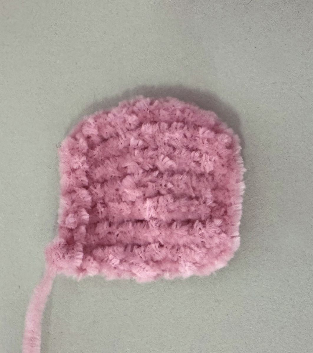 Blog content image for 'A fluffy little baby in a cozy deer, knitted.'