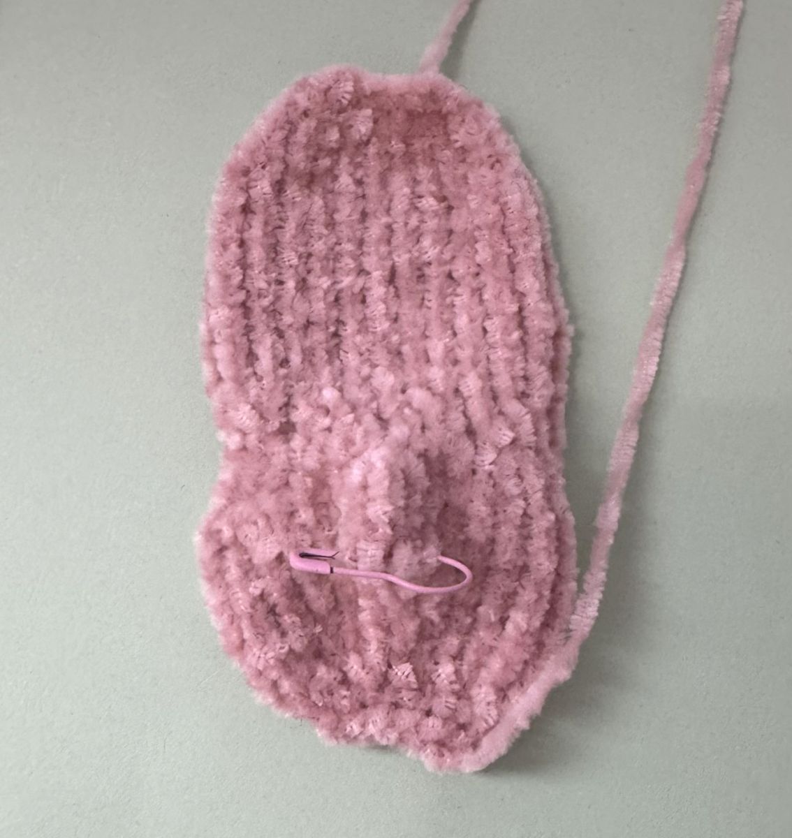 Blog content image for 'A fluffy little baby in a cozy deer, knitted.'