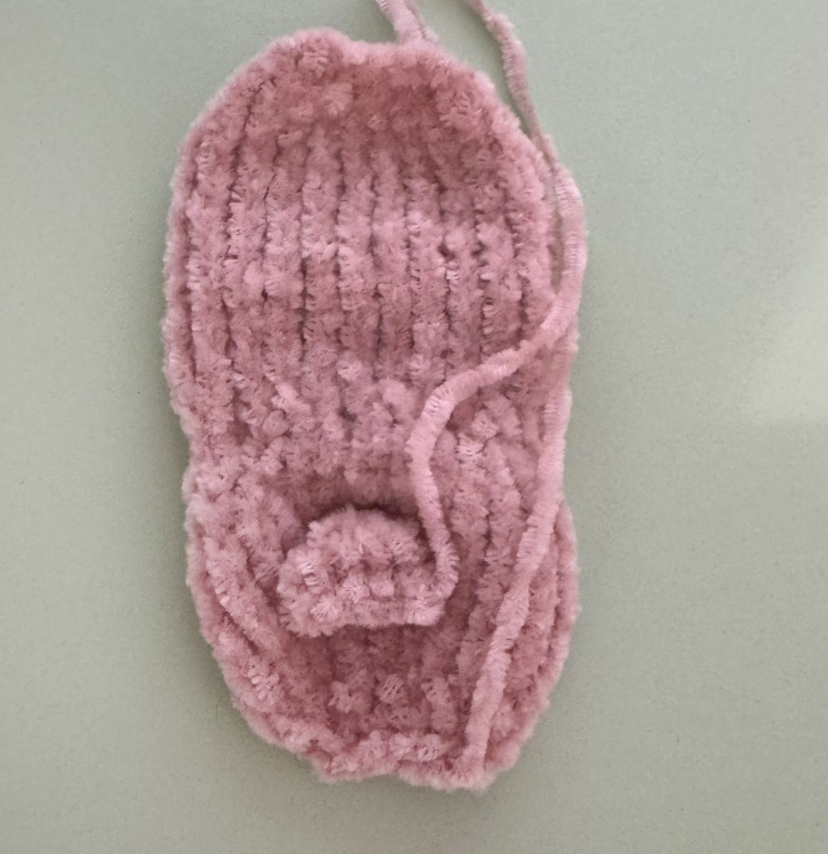 Blog content image for 'A fluffy little baby in a cozy deer, knitted.'