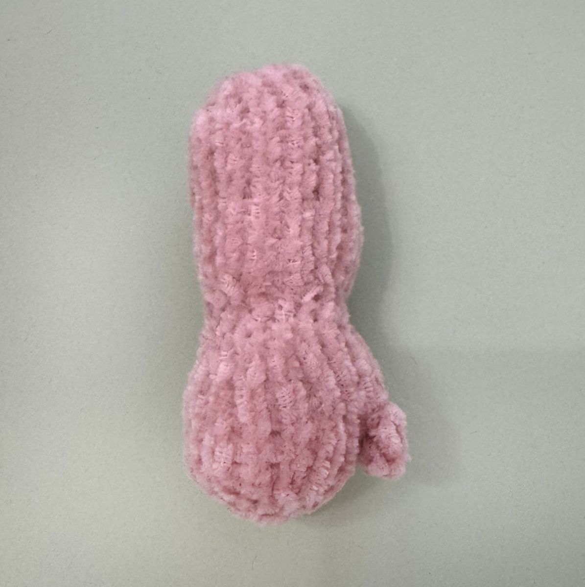 Blog content image for 'A fluffy little baby in a cozy deer, knitted.'