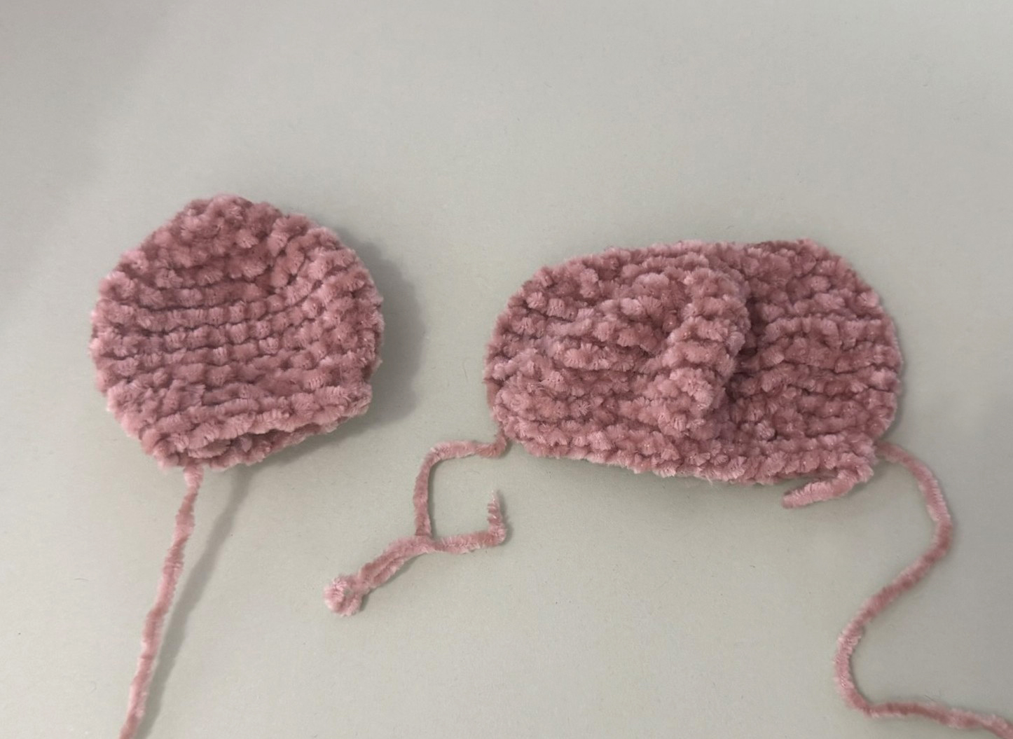 Blog content image for 'A fluffy little baby in a cozy deer, knitted.'