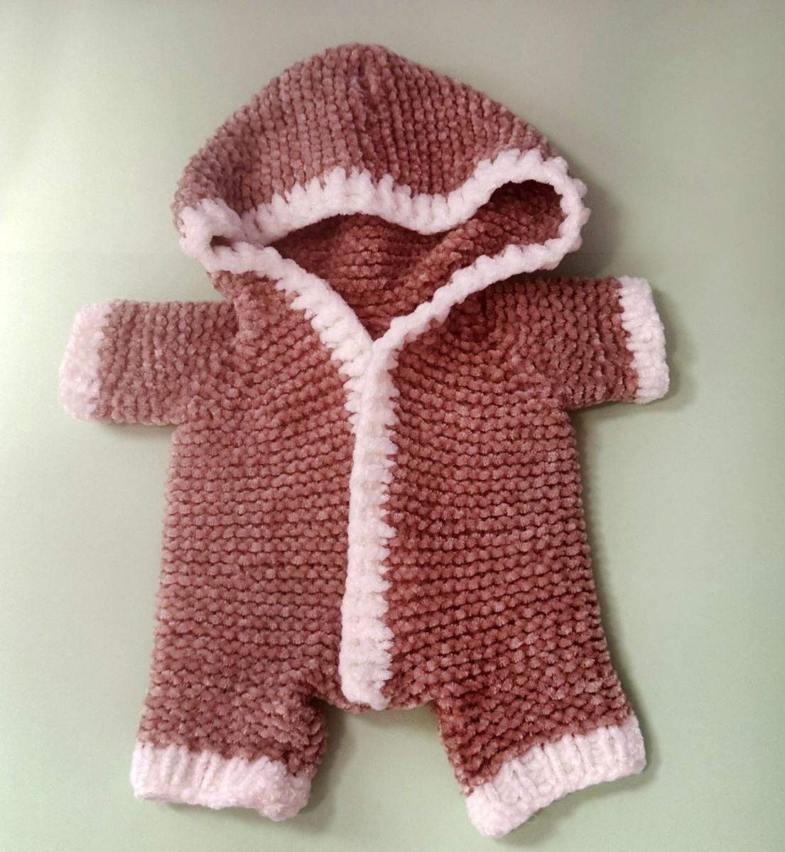 Blog content image for 'A fluffy little baby in a cozy deer, knitted.'