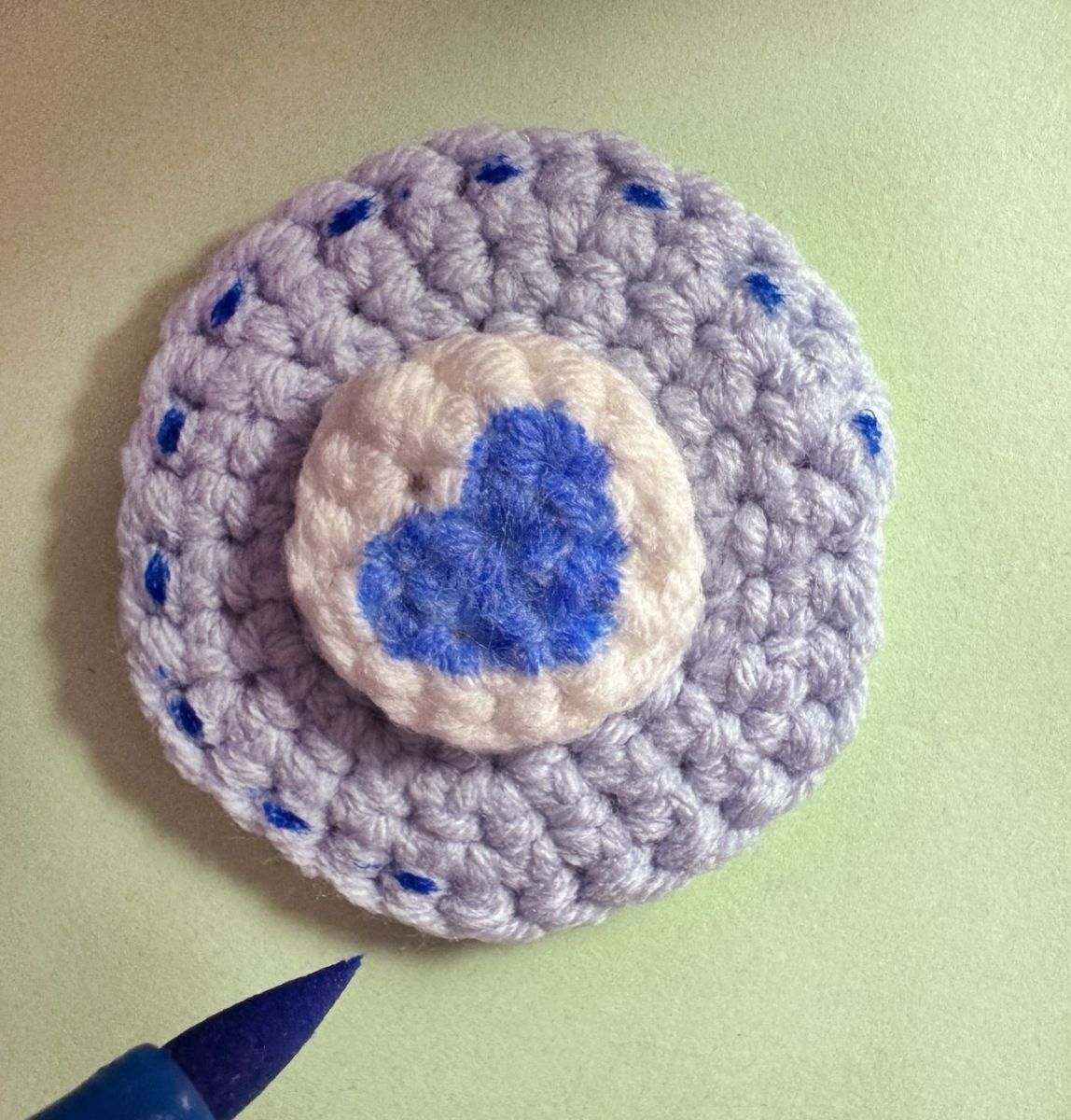 Blog content image for 'A fluffy little baby in a cozy deer, knitted.'