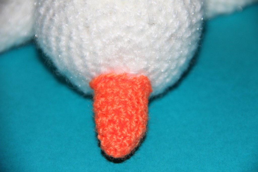 Blog-Inhaltsbild für 'Kostenlose Häkelanleitung - Kleiner Schneemann mit seinem Kuschelstern'